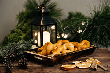 Christmas buns on a wooden board. Christmas. New Year's mood. High-quality photography