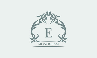 Fototapeta premium Graceful monogram in gray tones with the inscription and the letter E. Exquisite sign, logo of a restaurant, boutique, hotel, business