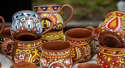 Fototapeta na wymiar Traditional homemade ceramic pots on traditional crafts fair
