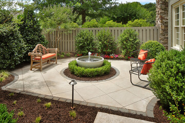 Backyard garden patio with water fountain - Powered by Adobe