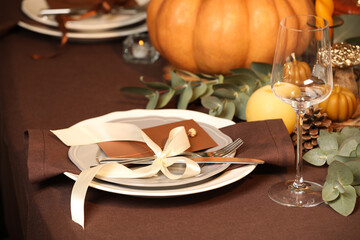 Beautiful autumn place setting and decor on table