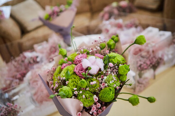 The composition is made by florists from fresh flowers at the party