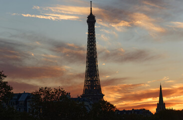 The Eiffel Tower at Sunset, Paris, France.It is the most popular travel place and global cultural icon of the France and the world.