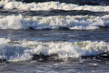 Seascape during a storm with big waves, close-up, Carnikava, Latvia. Big and powerful sea waves during the storm 