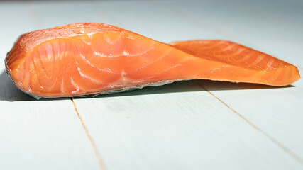 Smoked wild sockeye salmon on wooden background