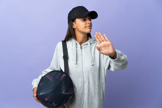 Young Sport Woman With Sport Bag Making Stop Gesture And Disappointed