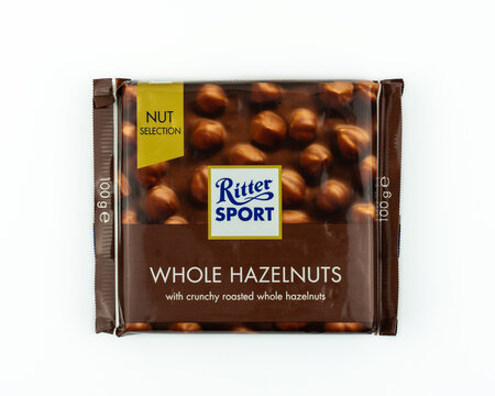 DOHA, QATAR - OCT 20, 2021: Ritter Sport Chocolate with Whole Hazelnuts isolated on white background. 