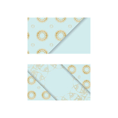 Business card in aquamarine color with luxurious gold ornaments for your contacts.