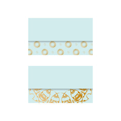 Business card in aquamarine color with Greek gold pattern for your brand.
