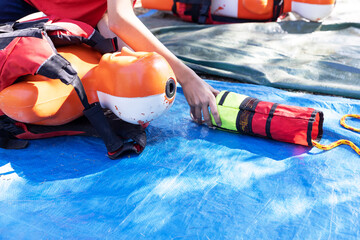 Lifeguard rescue course with training water drowning dummy
