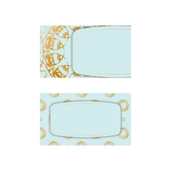 Business card in aquamarine color with luxurious gold pattern for your business.