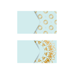 Business card in aquamarine color with Indian gold pattern for your brand.