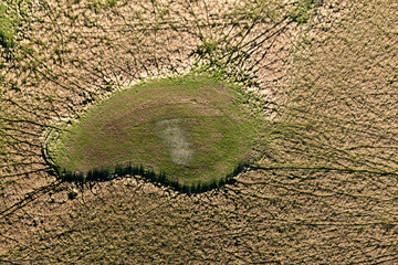 drone shot of farming landscape on a ranch in Australia, of a flooding river.