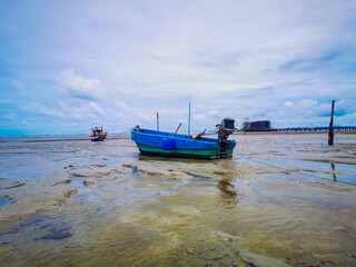 fishing boat at low tide