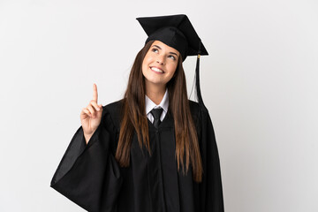 Teenager Brazilian university graduate over isolated white background pointing up a great idea