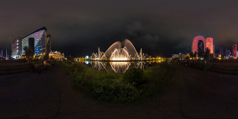full seamless spherical night 360 panorama singing light and music fountain near illuminated...