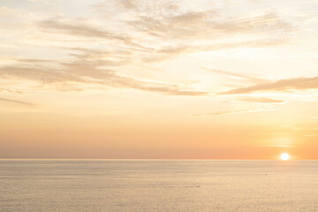 Naklejka na ściany i meble ixtapa sunset view from the beach ocean orange sunset horizon calm sea