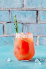 Cold lemonade/cocktail of fresh grapefruit juice.