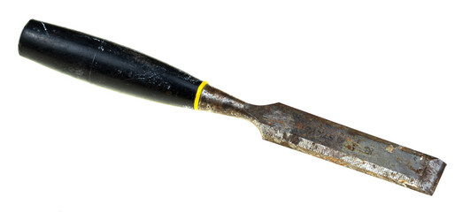 An old chisel on wood isolated on a white background