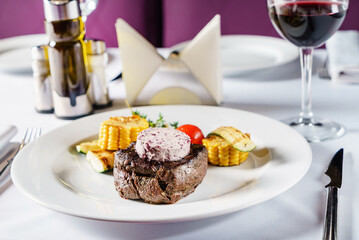 steak with grilled vegetables in restaurant