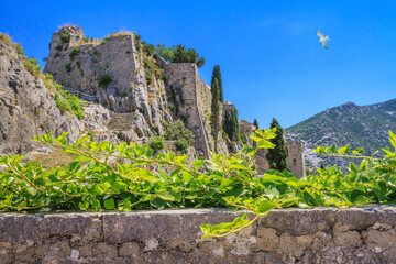 Summer mediterranean landscape - view of the Klis Fortress, which is located near Split on the...