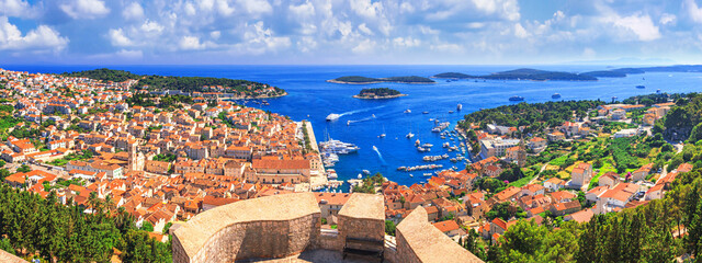 Coastal summer landscape, panorama from the fortress - top view of the town of Hvar, on the island...
