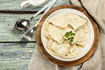 Dumplings with cottage cheese and sour cream