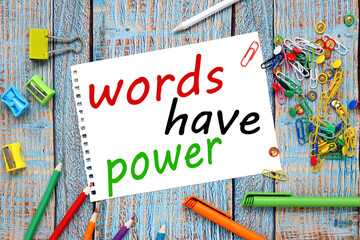Words have power ! text on white paper on wooden blue background business concept