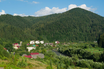 Fototapeta na wymiar Little village in Carpathian Mountain, Ukraine