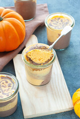 Curd pudding, half with pumpkin, half with cocoa
