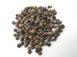 Black pepper spices isolated on white Background