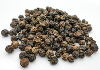 Black pepper spices isolated on white Background