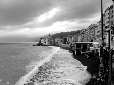 Liguria, Italy - October 10, 2021: Beautiful photography in black and white to the ligurian places  with panoramic view to the old buildings and clear sky in the background.
