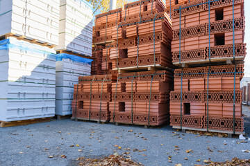 Building material on the outdoor market: ceramic bricks and aerated concrete blocks, gas blocks