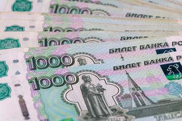 Beautiful background of thousandth banknotes. Abstract background, finance, budget, national currency and Russian rubles.