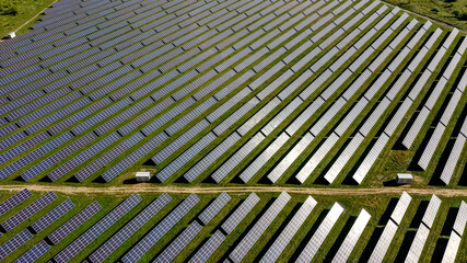 Solar panels in aerial view. power farm producing clean energy.