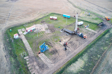 Repair of an oil well on a shift basis at a bush site. Shooting from a drone.