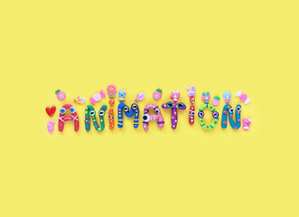 funny colorful letters made of plasticine made word 