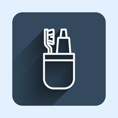 White line Toothbrush and tube of toothpaste icon isolated with long shadow background. Disposable bathroom supplies. Blue square button. Vector