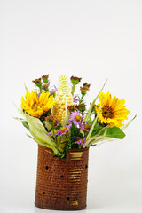autumnal flower arrangement with cob corn