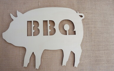 Plywood Pig with BBQ Cutout on Tan Burlap