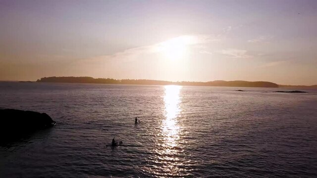 Kayaking During Sunset On The West Coast Of Canada