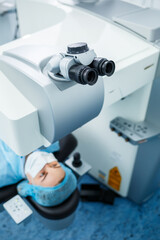 Professional medicine eye correction. Laser eye medical correction. - obrazy, fototapety, plakaty