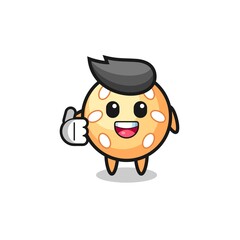 Obraz premium sesame ball mascot doing thumbs up gesture