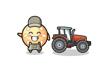 the sesame ball farmer mascot standing beside a tractor