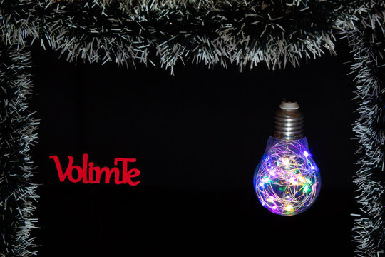 Bulb with LED lights in the Christmas edition. Minimal composition.