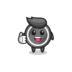 hockey puck mascot doing thumbs up gesture