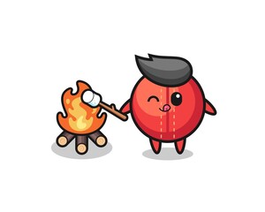 cricket ball character is burning marshmallow