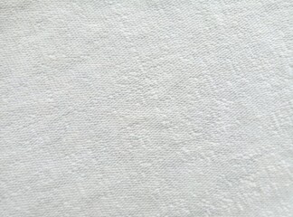 white elastic cotton fabric surface texture background with pores looking rough and hairy
