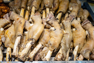 salted cooked sheep feet in a pot